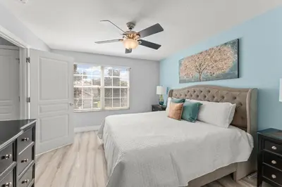 a bedroom with a bed and a ceiling fan at Windsor Hills View in Orlando