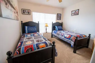 a bedroom with two beds and a window at Free pool-spa heat - Near Disney - Nature view in Orlando