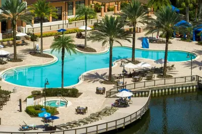 an overhead view of a pool at a resort at Central House Near Disney in Orlando