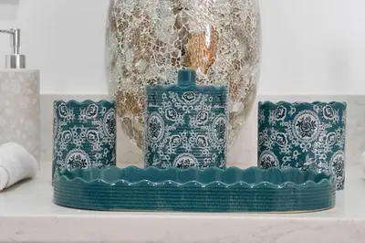 a shelf with two blue and white plates and a vase at Luxury Villa, Welcome to EDC, Pool & Spa in Orlando