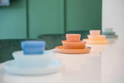 three colored bowls sitting on top of a table at Windsor Hills Family-Friendly 3BR Pool Townhome in Orlando