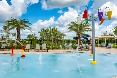 a pool at a resort with a water park at Charmosa Casa 4Q c/ Piscina - Perto da Disney in Kissimmee