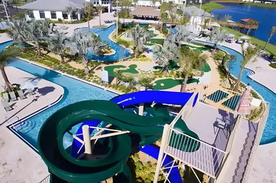 an aerial view of a water park at a resort at Villa 6Q Luxo c/ Piscina, Spa e Perto da Disney in Kissimmee