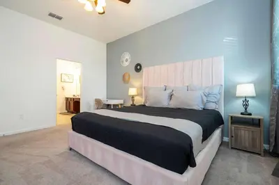 a bedroom with a large bed in a room at Family Friendly 12Bd w Jacuzzi Veranda Palms 4401 in Kissimmee