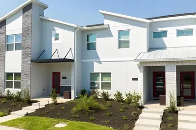 a rendering of a white building with red doors at Casa 4Q c/ Piscina e Quartos Temáticos in Kissimmee