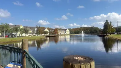 a river with a fountain in the middle of it at Luxury house in Disney in Kissimmee