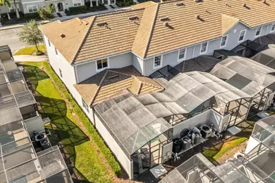 an overhead view of a house with roofs at 5 Bedrooms 4 Bathrooms Storey Lake 4984Wa in Kissimmee