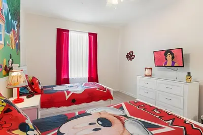 a bedroom with a mickey mouse bed and a dresser at Condo 3Q Windsor Hills — Perto da Disney in Orlando
