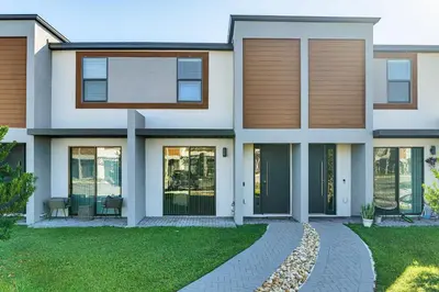 a rendering of a house with a front yard at 4 Mi to Disney! Pet-Friendly Home with Pool Access in Kissimmee