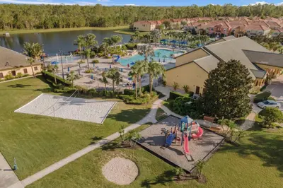 an aerial view of a pool at a resort at Fun Family Villa Pool BBQ Near Disney World in Kissimmee