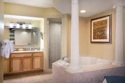 a large bathroom with a tub and a sink at Wyndham Star Island Resort-2BR- Apartment with Resort Access in Kissimmee