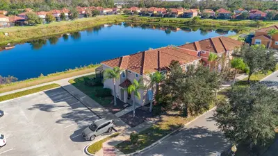 an overhead view of a house with a lake at 4BR Lake View Home Bella Vida in Kissimmee
