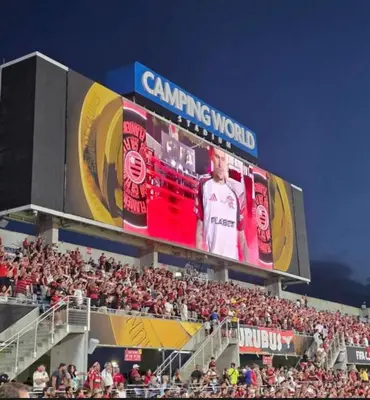 a crowd of people in the stands at a stadium at LuXury Stay | Pool + Gym + Fast Wi-fi in Orlando