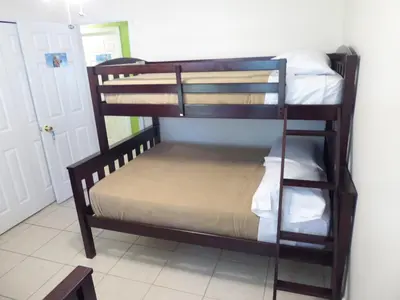 a couple of bunk beds in a room at Perfecto Mundo 3, Orlando Area 5BR-2BA-Outdoor Pool-Jacuzzi-Billiard in Orlando