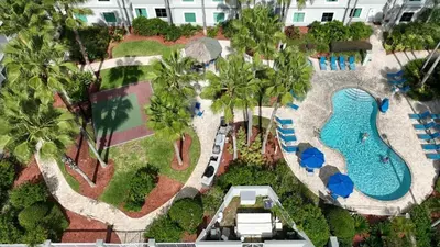 an aerial view of a resort with a swimming pool at Suite near Disney, free parking and shuttle to Parks in Orlando