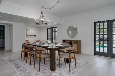 a dining room with a table and chairs at Orlando Lake View Entire Home-NearDowntown in Orlando
