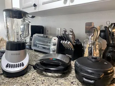 a blender on a counter next to a toaster at Sea World Orlando Apt - Minutes From Parks in Orlando
