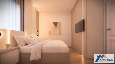 a bedroom with a bed with white sheets and a television at The Epic San Jose Paradiso Grande Orlando Florida in Orlando