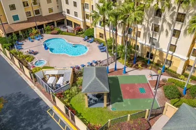 an aerial view of a swimming pool at a resort at Modern Unit w Themed Room, Full Kitchen and Prime Location in Orlando