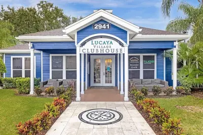 a blue house with a sign that reads loxka winter guidance at Casa 3Q Lucaya Village — 15min da Disney in Kissimmee