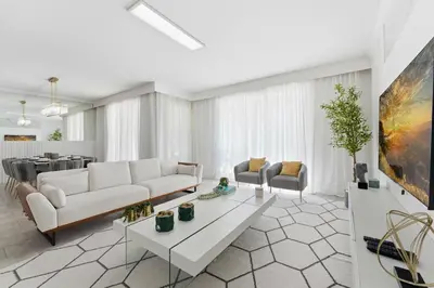 a living room with a couch and a table at 4350 Storey Lake 17 guests near parks poolspa in Kissimmee