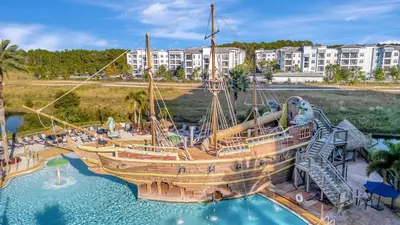 a model of a pirate ship in a water park at 2BR Fireworks View with Pool & Spa 5 Minutes to Disney in Orlando