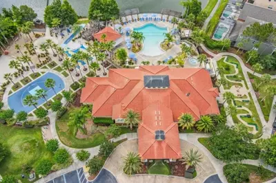 an aerial view of a house with a swimming pool at Ormond Retreat townhouse in Kissimmee