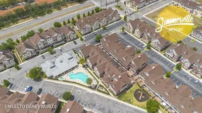 an overhead view of a city with houses and a street at Sunrise Shores townhouse in Orlando