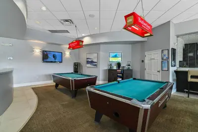 a pool room with two pool tables in it at Adventure Awaits! Pool Home just 10 Min to Disney! in Kissimmee