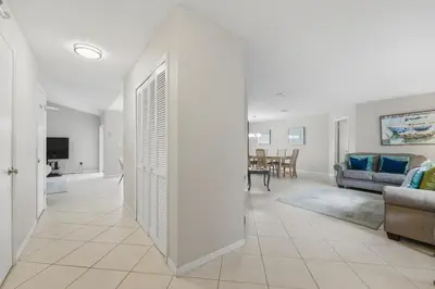 a living room with a couch and a table at Ultimate Resort Gateway in Orlando