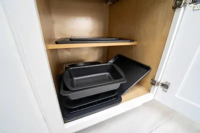 a drawer with a tray and other items in it at Close to the Action, Peaceful When You Return in Orlando