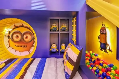 a childs room with a bed with a minions bedroom at Casa 5Q Moderna c/ Piscina – 15min Disney in Orlando