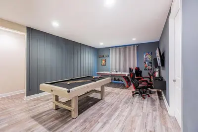 a game room with a pool table and two tables at Incredible 8BR PetFriendly Encore Resort next to Disney - 7474 in Orlando