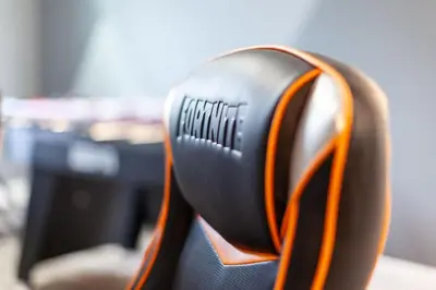 a close up of a black and orange steering wheel at Amazing 6BR at Storey Lake next to Disney - 2835 in Kissimmee