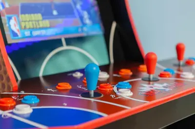 a close up of a table with a game controller at Gorgeous 6BR at Storey Lake next to Disney - 2850 in Kissimmee