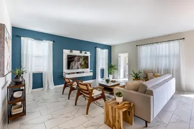 a living room with a couch and a table at Stunning 6BR Lakeview at Storey Lake next to Disney - 2929 in Kissimmee