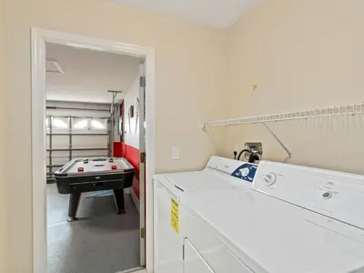 a room with a ping pong table and a room with a pool table at Holiday Home Ferienvilla mit Garten- Grill und Terrasse by Interhome in Orlando