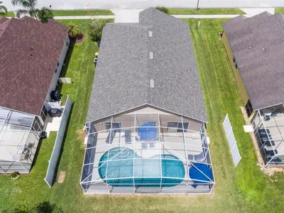 an overhead view of a house with a swimming pool at Holiday Home Ferienvilla mit Garten- Grill und Terrasse by Interhome in Orlando