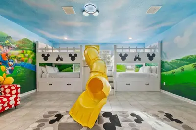 a childs room with a slide in the middle at 4177 Paragraph Drive in Kissimmee