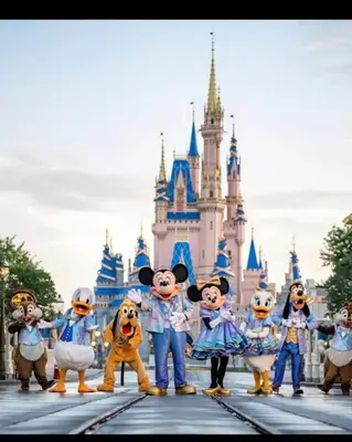 a group of mickeys standing in front of disney castle at Condo Universal Disney Epic Free Parking in Orlando