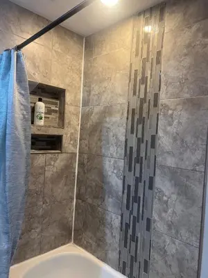 a bathroom with a shower with a shower curtain at Condo Universal Disney Epic Free Parking in Orlando