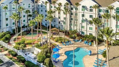 an aerial view of a hotel with a resort at FREE Shuttle & 50 Dollars Disney Gift Card Disney Resort Condo in Orlando