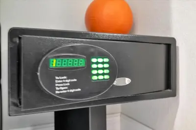 a digital clock on a wall with an orange at FREE Shuttle & 50 Dollars Disney Gift Card Disney Resort Condo in Orlando
