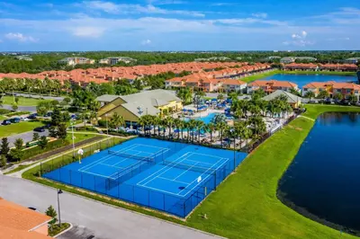an aerial view of a tennis court at a resort at Four Bedroom Private Pool Townhome, near Disney in Kissimmee