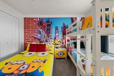 a bedroom with two bunk beds with hello kitty at Chic Resort Getaway – 15 Min to Disney in Kissimmee