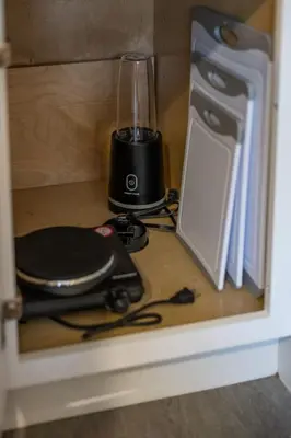 a blender sitting on top of a counter at Cozy Orlando Studio with Jacuzzi, Fire Pit, and BBQ in Orlando