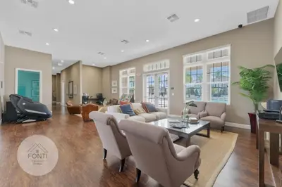 a living room with a couch and a table at 8925 Resort 4BR Townhouse by Disney World Orlando in Kissimmee