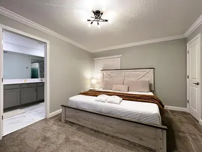 a bedroom with a bed and a ceiling fan at 4263PD-New Listing- 5 bed/4 bath-Private Pool in Kissimmee