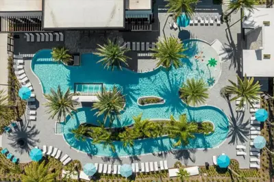 an overhead view of a swimming pool with palm trees at 6277SK-New Brand-12bed/11.5bath-Private Pool&SPA in Orlando