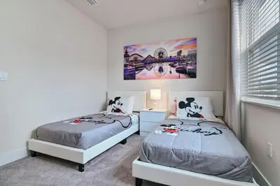 a bedroom with two beds and a window at New townhouse in Clermont -Orlando area in Orlando